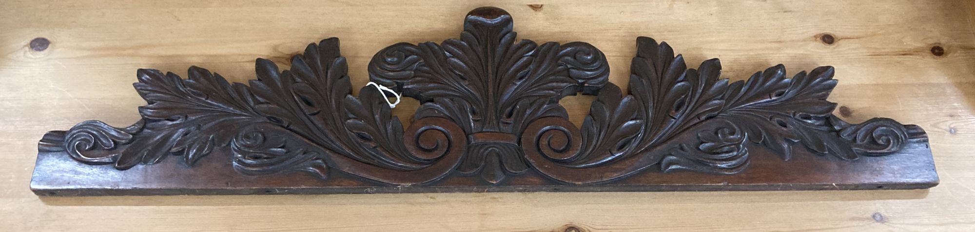 A 19th century carved pediment, width 91cm, height 22cm